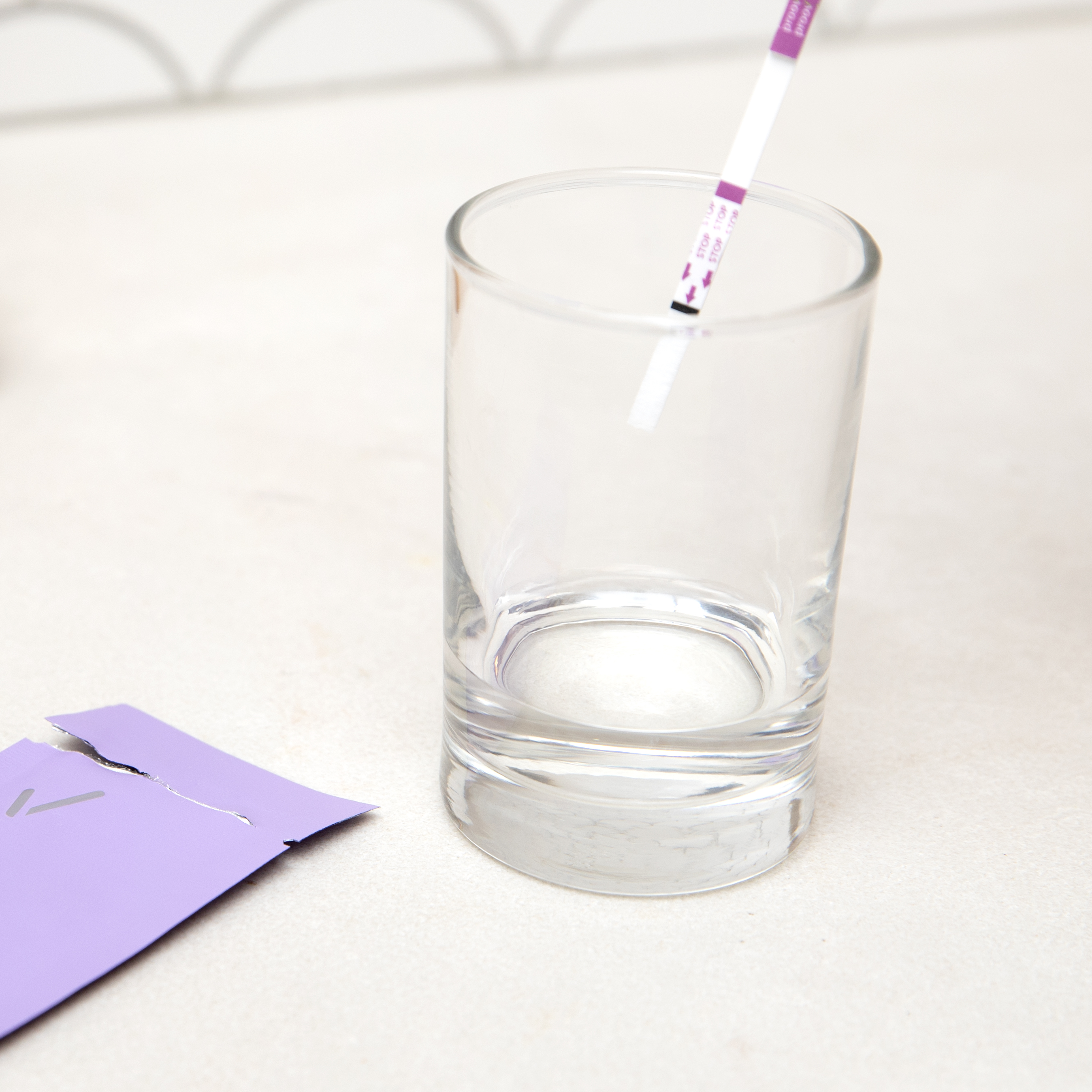 dipping confirm test strip into sample