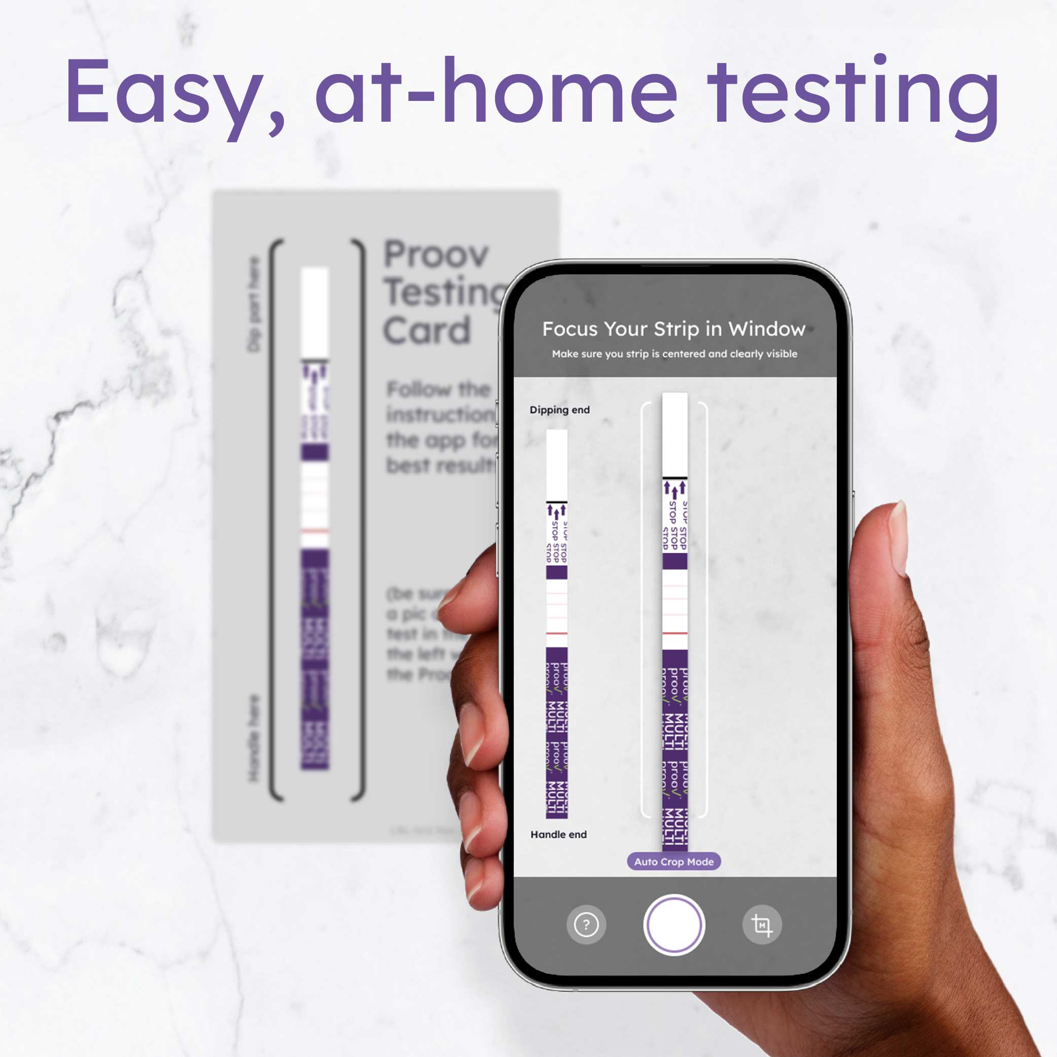 A hand holds a smartphone displaying a testing card with instructions for at-home testing.